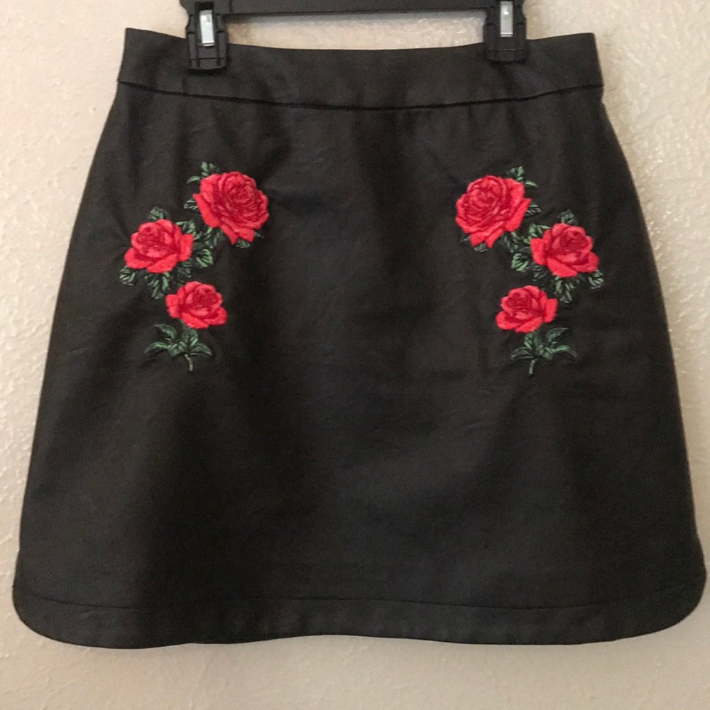 Faux leather skirt with rose embroidery